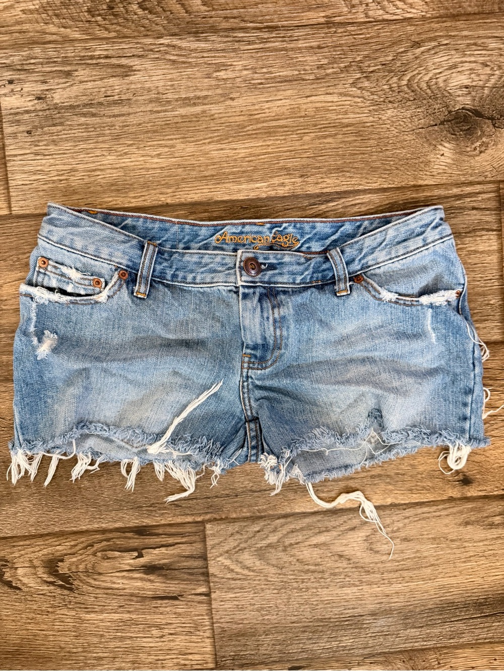 Low Waisted American Eagle Light Blue Distressed Cutoff Denim Shorts